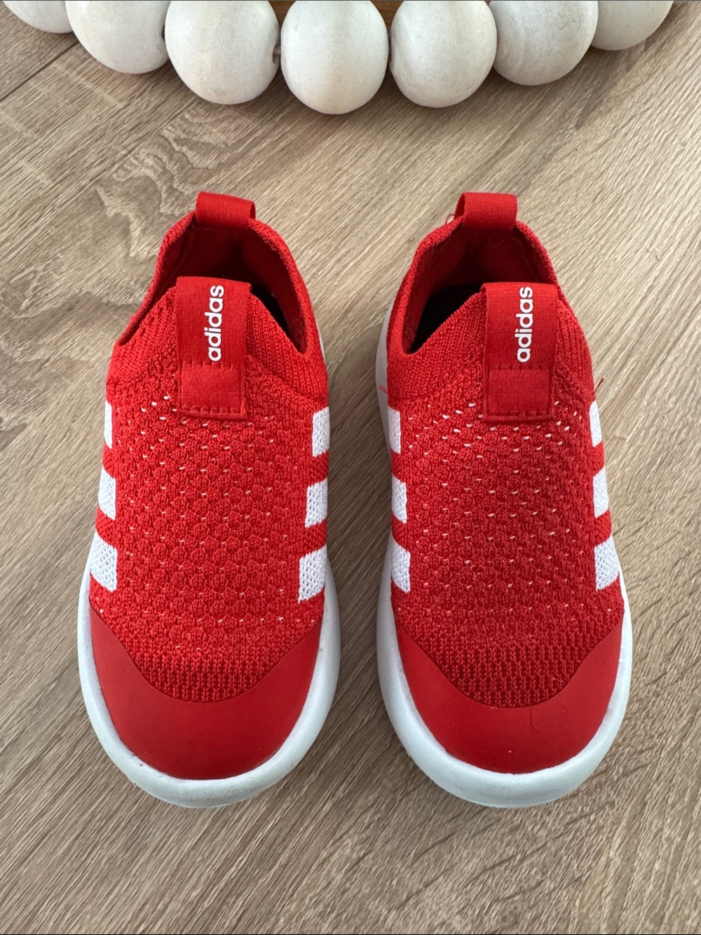 adidas Kids Red Slip-On Knit Sneakers with White Stripes
